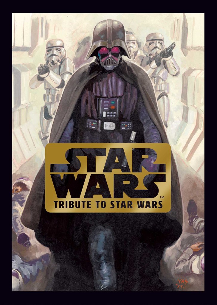 The cover to Star Wars: Tribute to Star Wars. A blank border surrounds a drawing of Darth Vader with stormtroopers behind him. The title logo is in front as a gold plate with the corners beveled and the Star Wars logo cut out. The art is by Yasuhiko Yoshikazu.