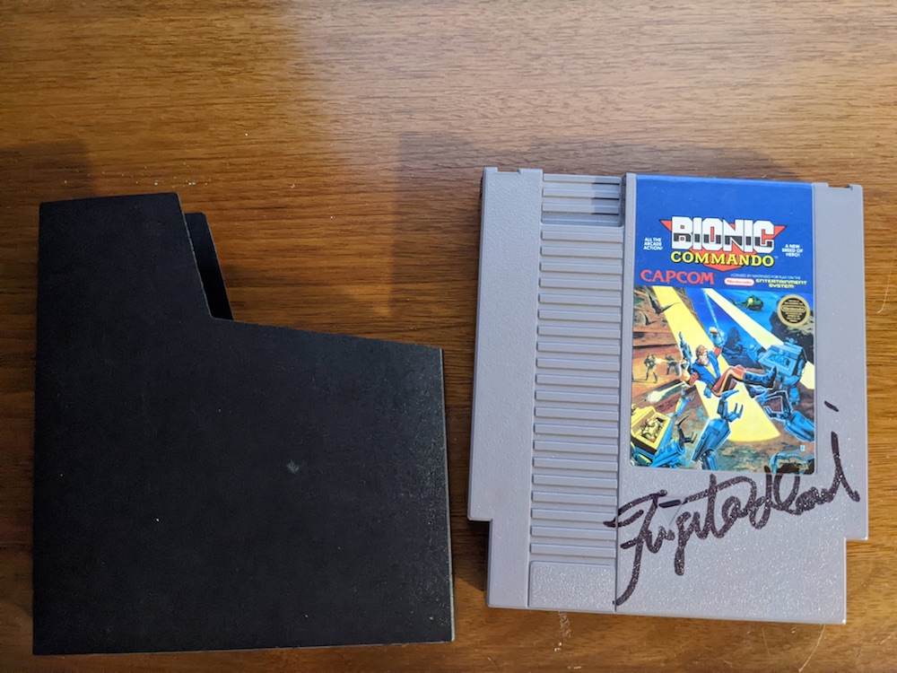 An autographed copy of Bionic Commando for the NES.