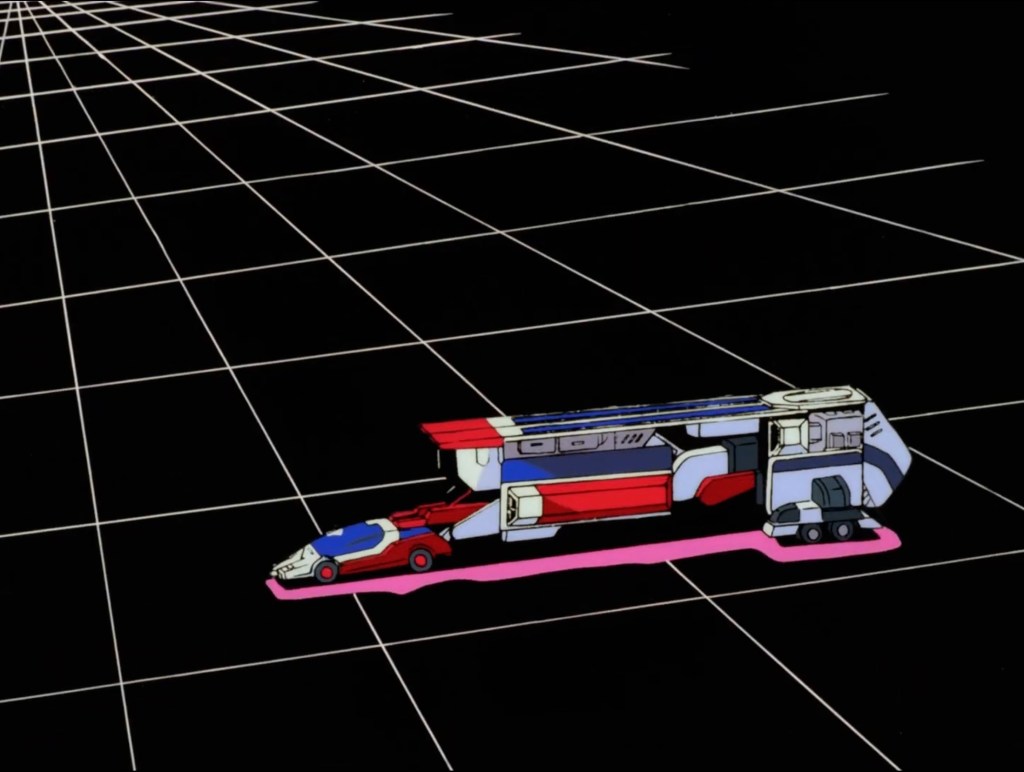 As creenshot Exkizer in car form attached to the King Roder as a large trailer. The trailer is about 3.5 times larger than the car.
