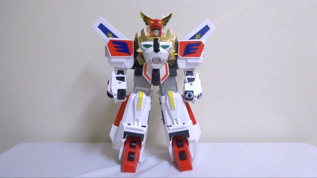 The original toy version of King Exkaiser. It's a robot with a lion on his chest and wide, boxy proportions.